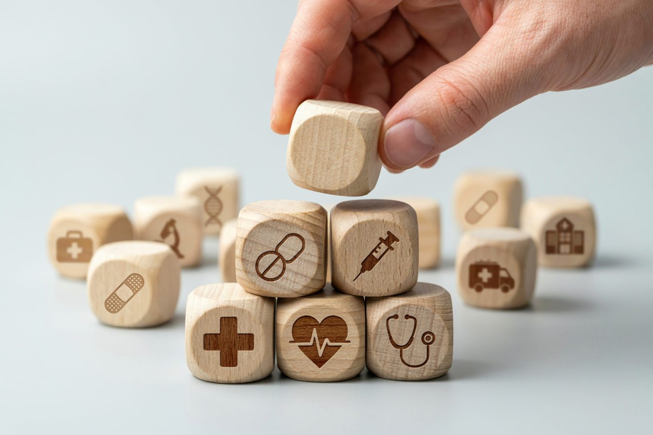 Businessman shows medical network wooden block for health, medicine, insurance, healthcare, care, concept. Medical technology services to solve public health problems. medical business digital